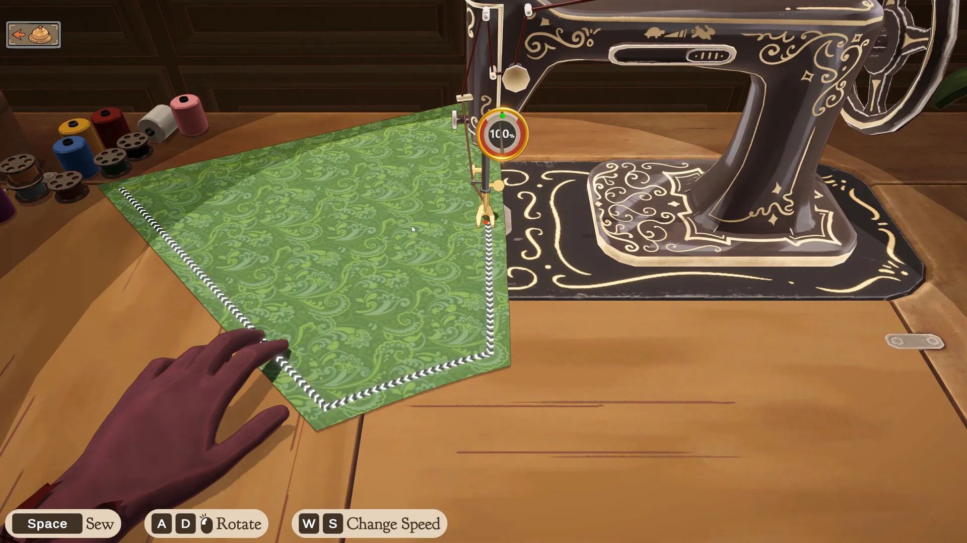 The sewing machine screen with the keys Space Sew, A D Rotate and W S Change Speed along the bottom.